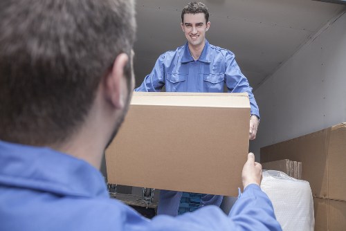 Professional removals in Hamptonhill with moving van and packed boxes
