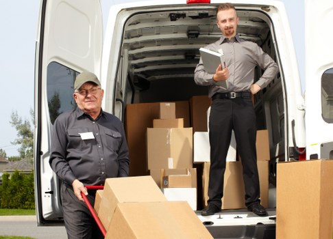 Packed moving boxes ready for house removals in Hamptonhill