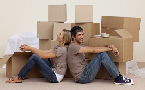 Packed boxes and furniture ready for Hamptonhill small removals