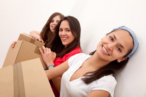 Team handling furniture during local removals in Hamptonhill